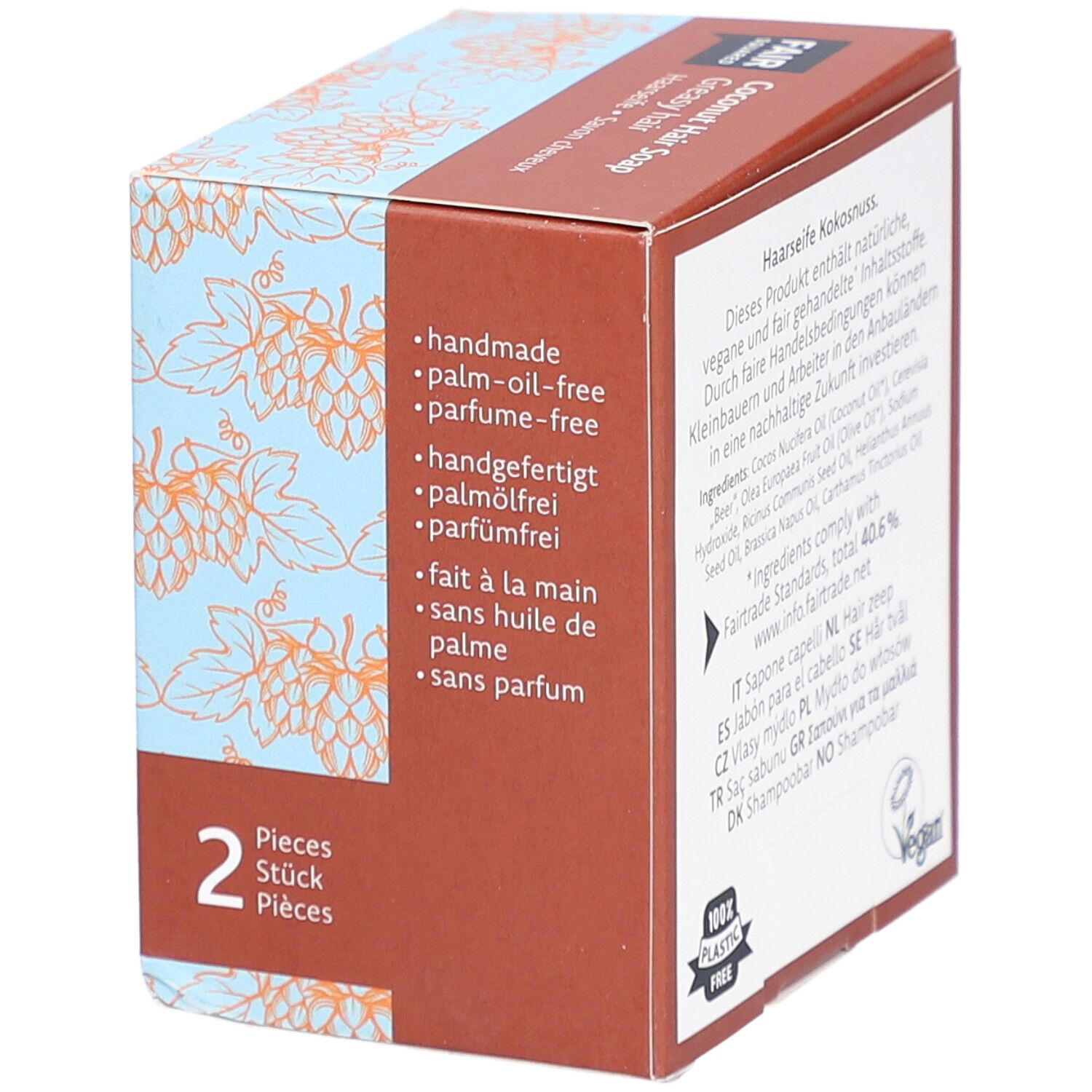Boîte de FAIR SQUARED Haarseife Coco. Inscription : FAIR SQUARED, fait à la main, sans huile de palme, sans parfum, 2 pièces, label Vegan.