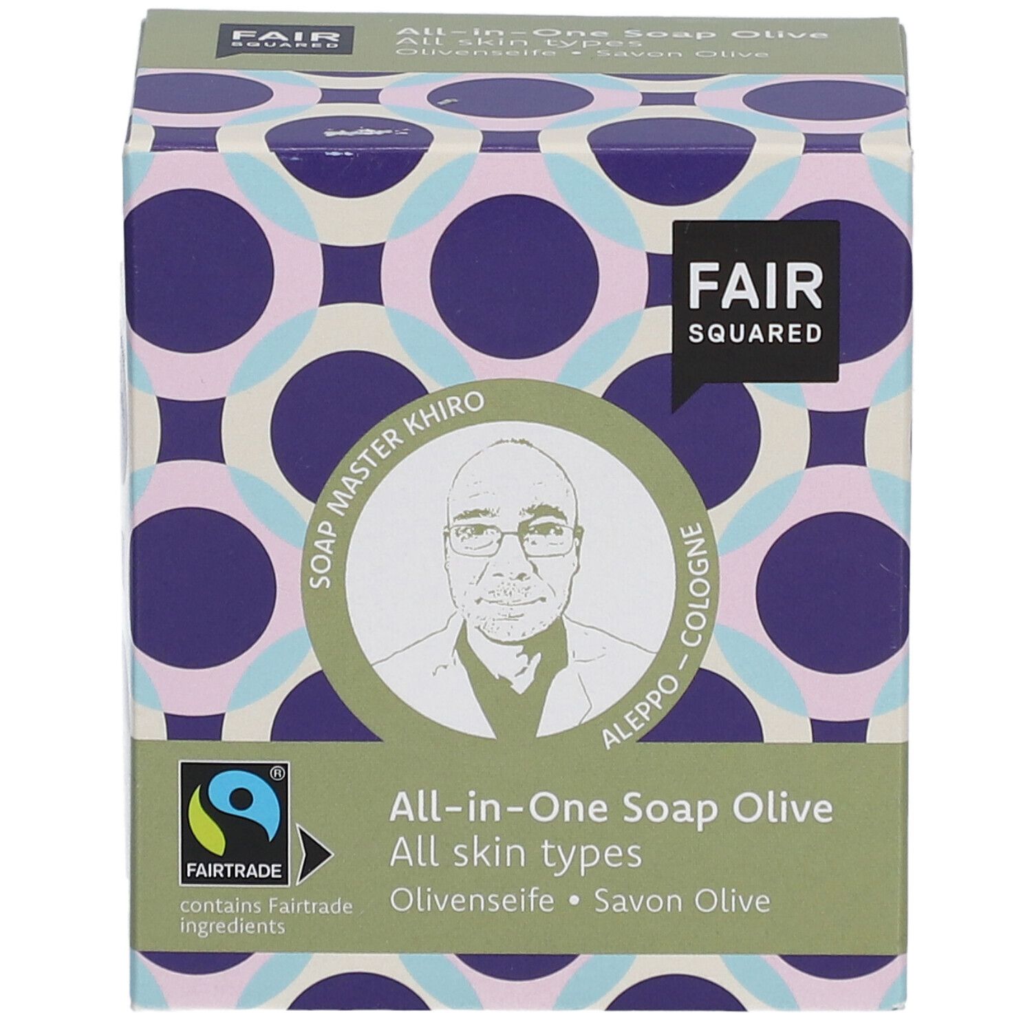 Emballage de savon All-in-One Olive FAIR SQUARED. Label Fairtrade, portrait de Soap Master Khiro.