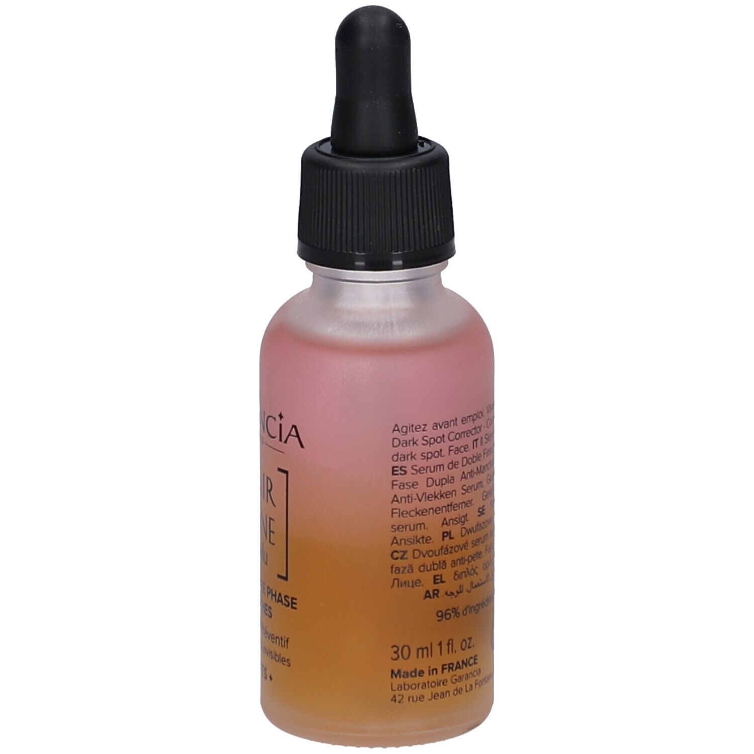 Flacon de sérum biphasé, dos avec indications multilingues et indication de volume.