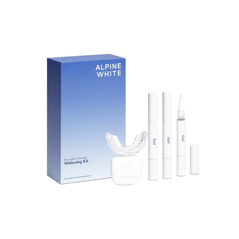 Kit de blanchiment avec lumière LED et gel. Boîte bleue avec nom du produit. Accessoires : gouttière, stylos gel.