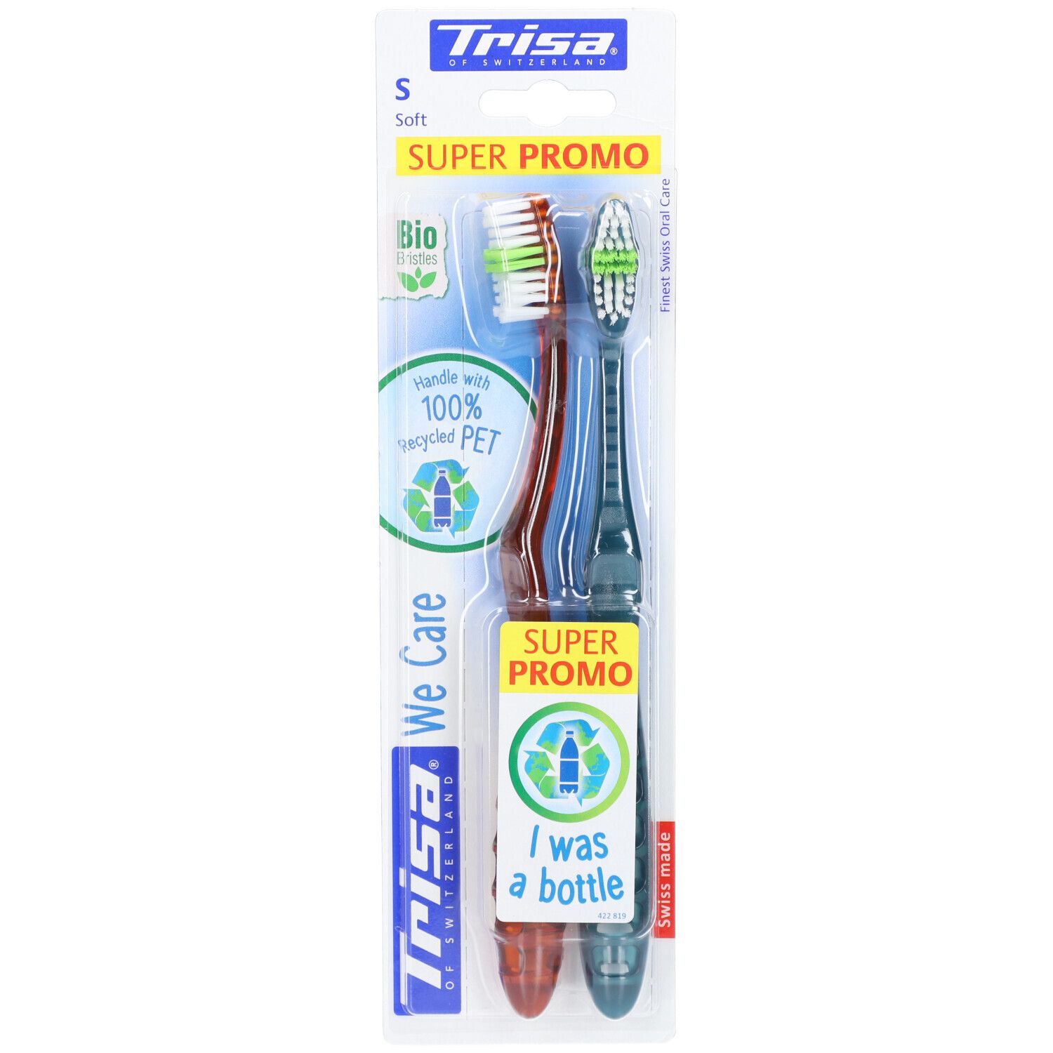 Deux brosses à dents dans un emballage blister. Manches verts et rouges, soies blanches. Texte "Super Promo" et "I was a bottle".