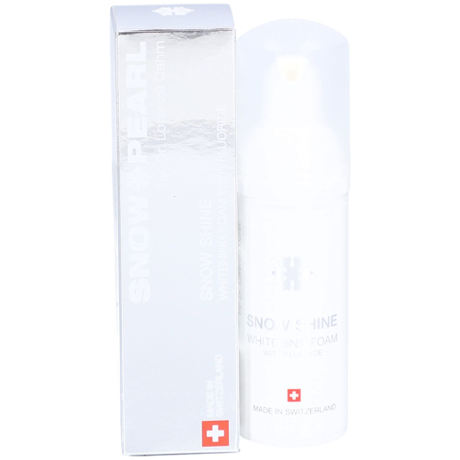 Flacon et boîte du produit. Inscription: Snow Pearl, Snow Shine Whitening Foam avec fluorure. Croix suisse.