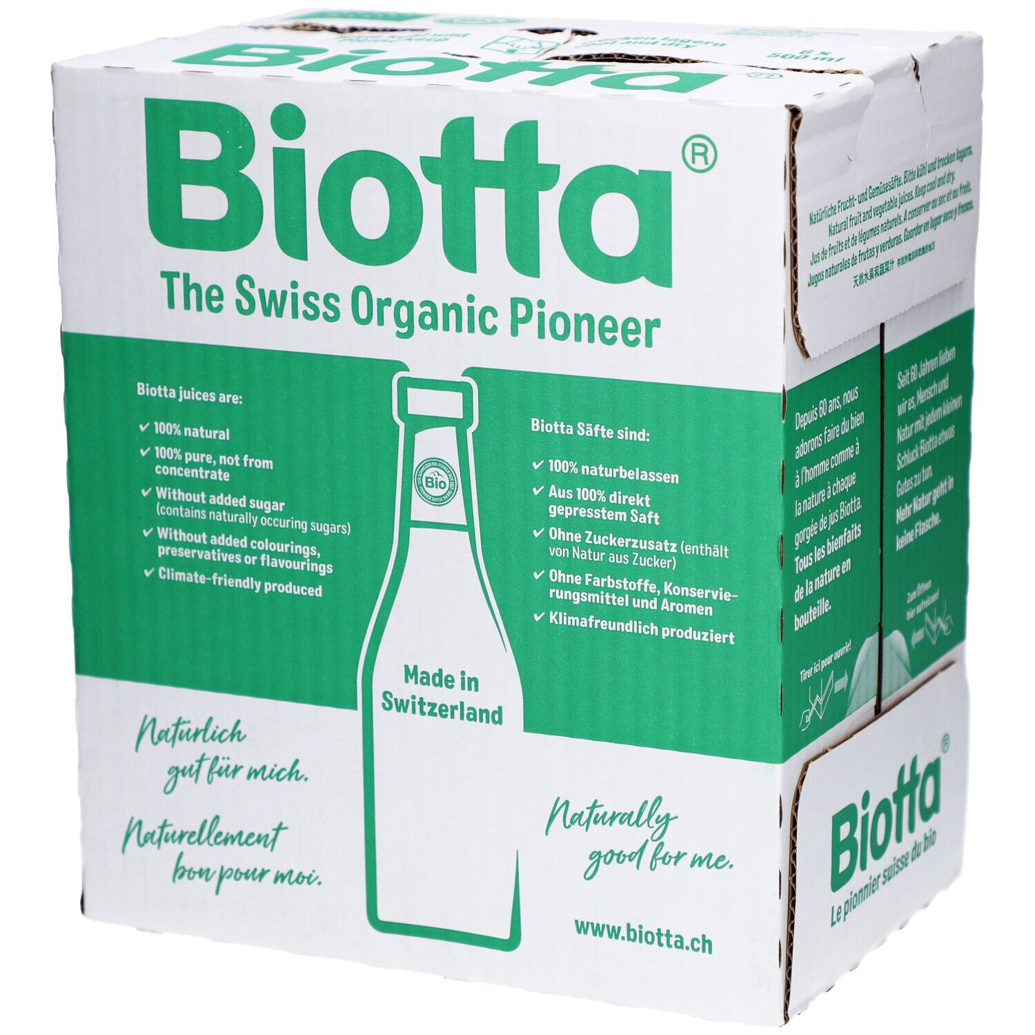 Carton BIOTTA avec texte vert et image de bouteille. Texte: "The Swiss Organic Pioneer", "Made in Switzerland".