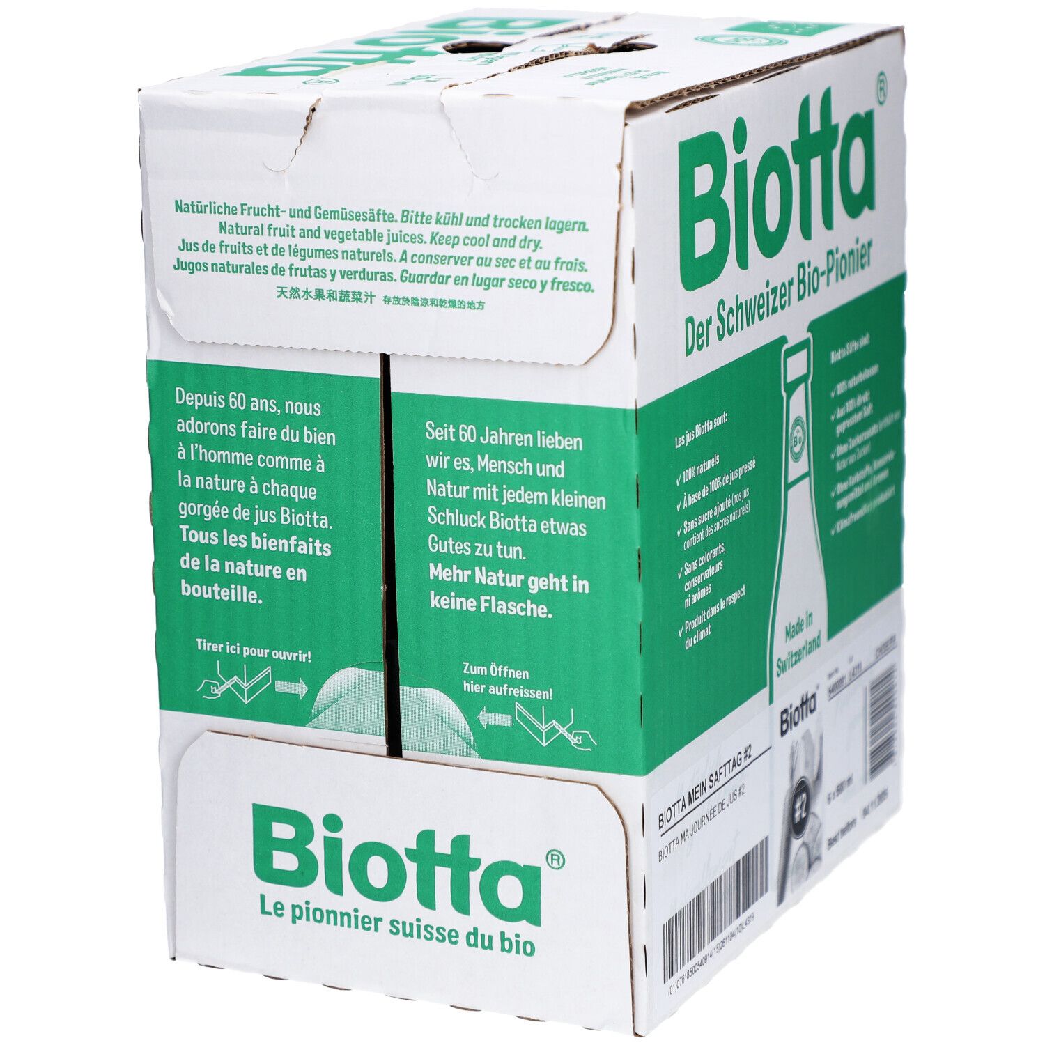 Carton BIOTTA avec texte vert. Texte: "Jus naturels de fruits et de légumes".