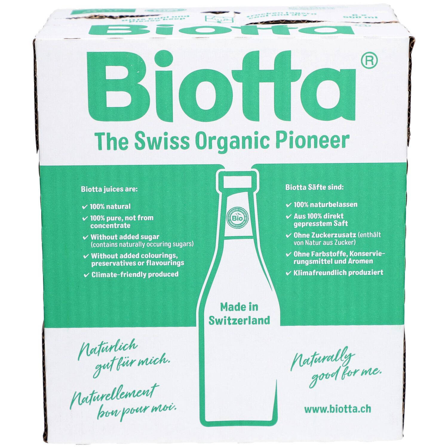 Carton BIOTTA avec texte vert et image de bouteille. Texte: "The Swiss Organic Pioneer", "Made in Switzerland".