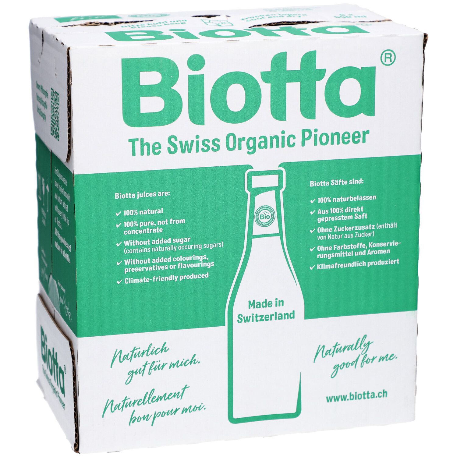 Carton BIOTTA avec texte vert et image de bouteille. Texte: "The Swiss Organic Pioneer", "Made in Switzerland".