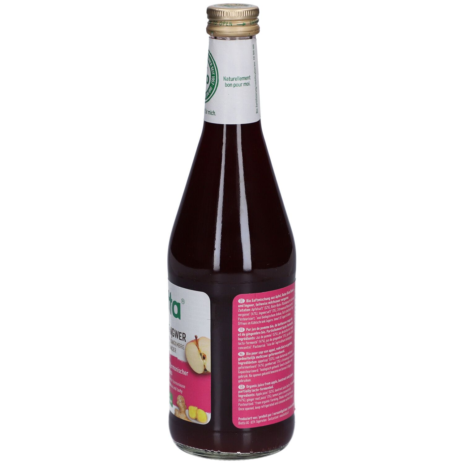 Vue arrière de la bouteille en verre de jus rouge. Étiquette avec informations nutritionnelles et label bio. Label Vegan.