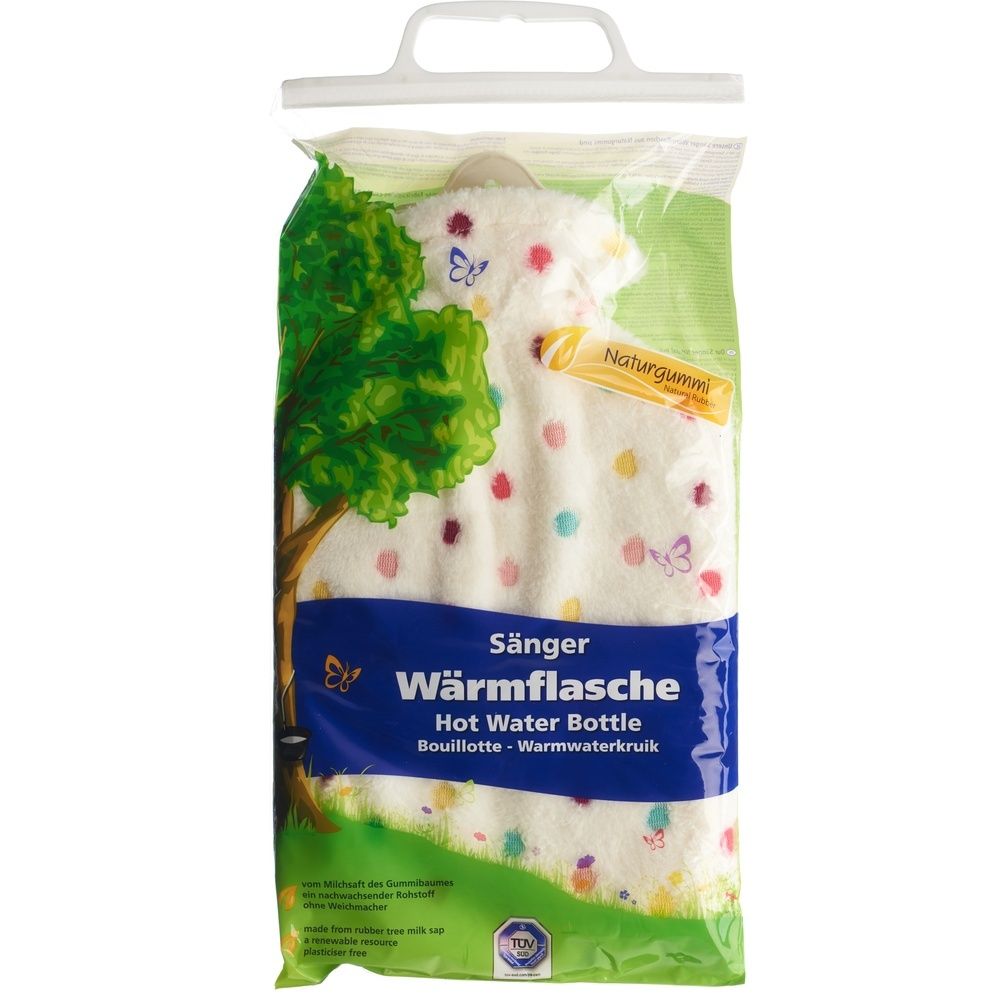 Bouillotte en emballage plastique. Peluche blanche à pois et papillons colorés. Inscription : SÄNGER Wärmflasche.