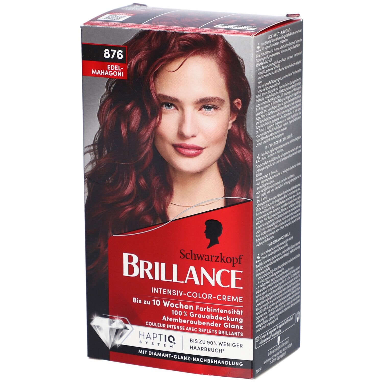 Boîte de Brilliance 876 Edelmahagoni. Boîte rouge avec visage de femme. Inscription Schwarzkopf Brilliance.