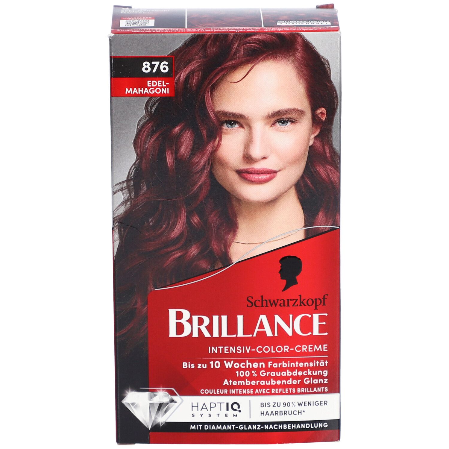 Face avant de la boîte Brilliance 876 Edelmahagoni. Boîte rouge avec visage de femme. Inscription Schwarzkopf Brilliance.