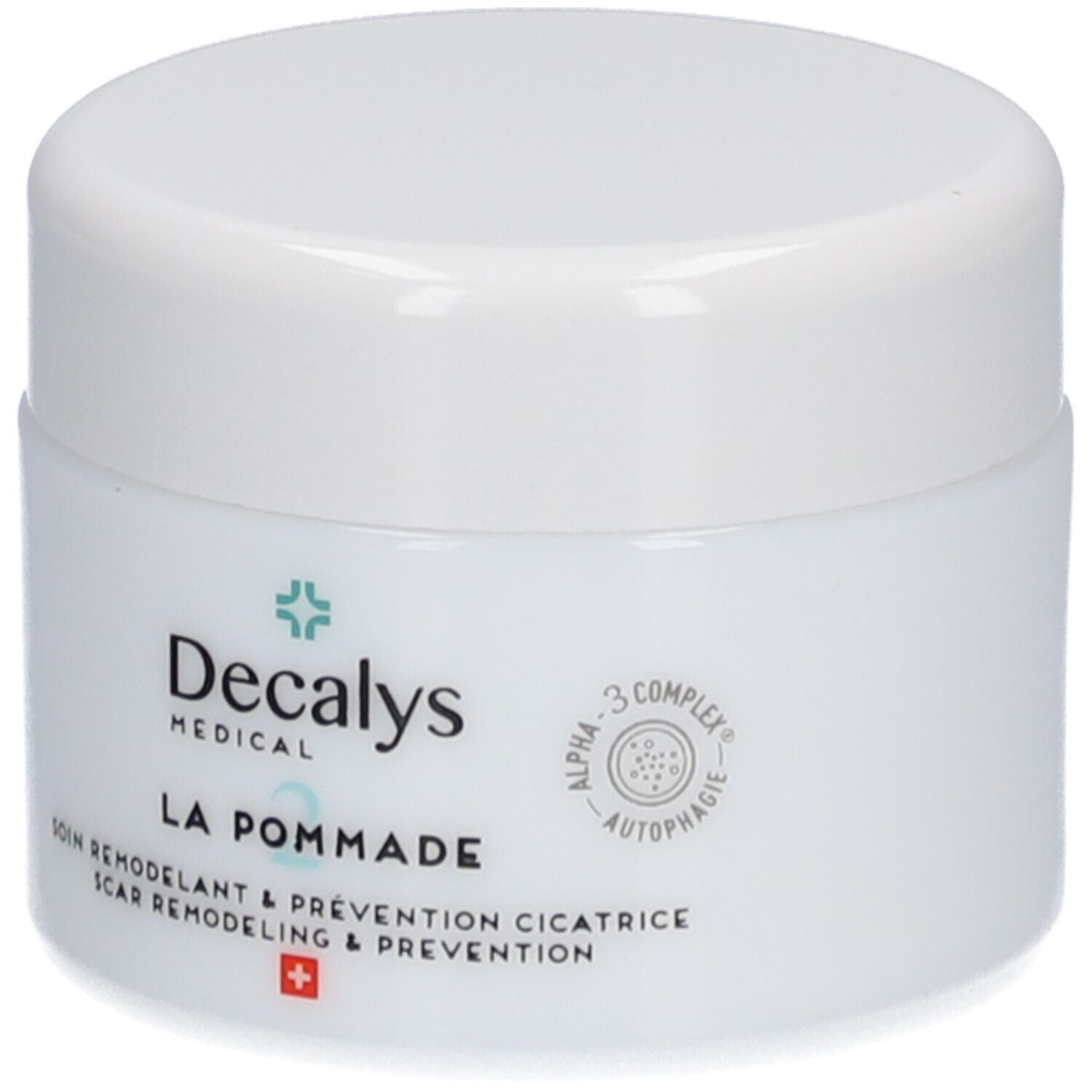 Pot blanc avec couvercle. Inscription: Decalys Medical, La Pommade, Alpha-3 Complex, croix suisse.