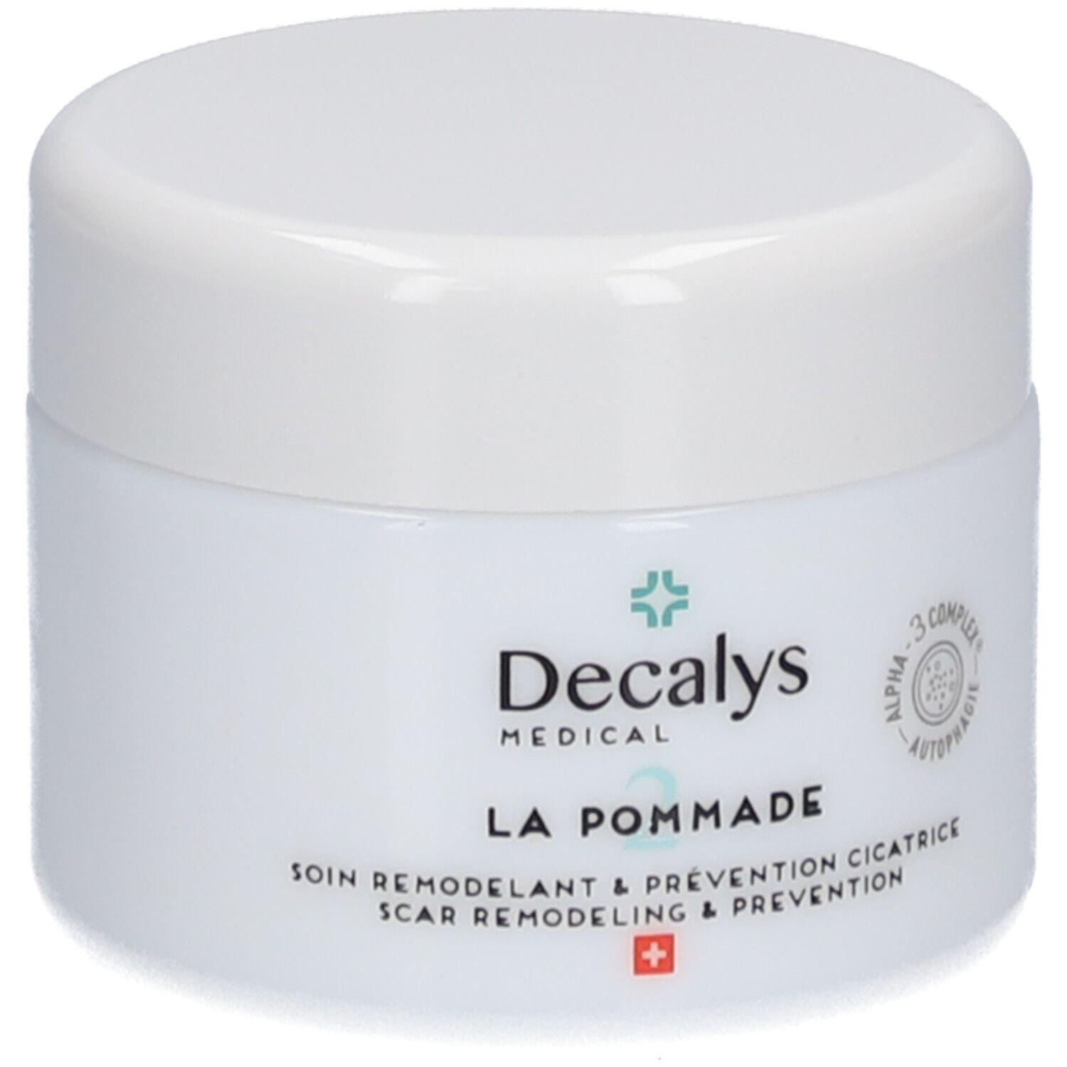 Pot blanc avec couvercle. Inscription: Decalys Medical, La Pommade, Alpha-3 Complex, croix suisse.