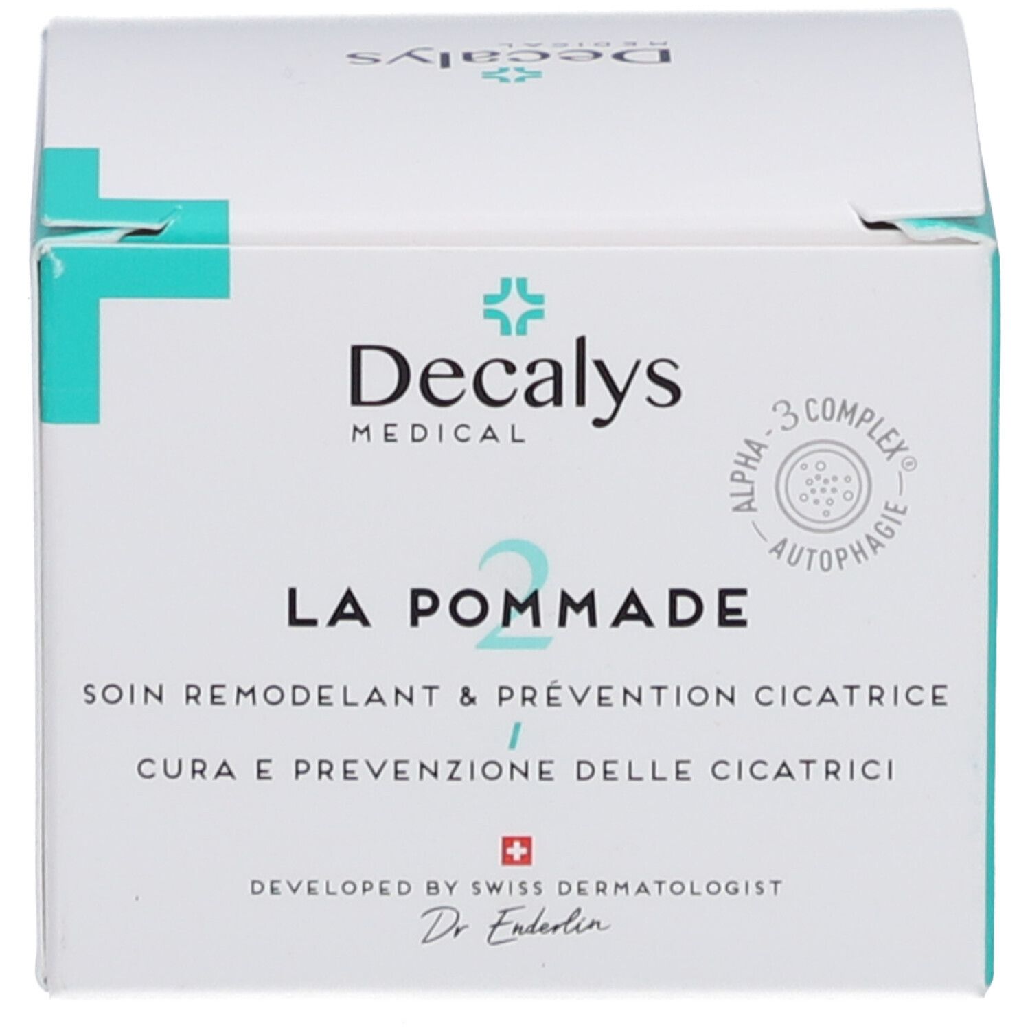 Emballage du produit. Inscription: Decalys Medical, La Pommade, Alpha-3 Complex, croix suisse.