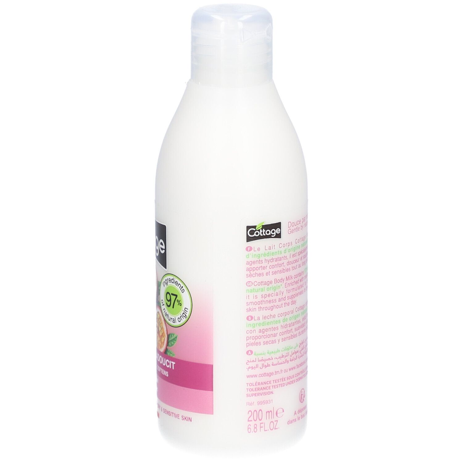 Flacon blanc de lait pour le corps. Inscription: Cottage, Lait Corps, Hydrate & Adoucit. 200 ml. 6.8 FL.OZ. 97% ingrédients d'origine naturelle.