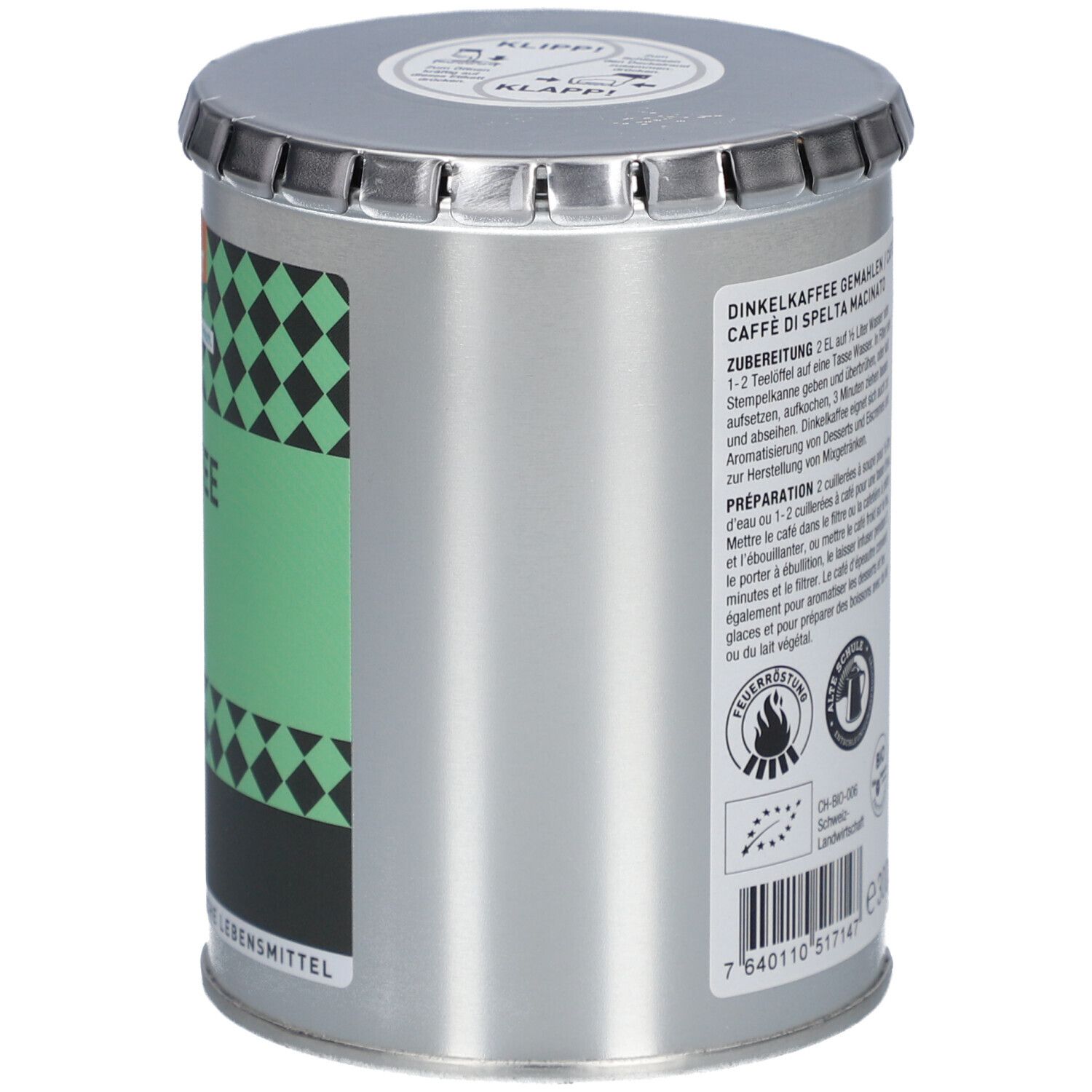 Récipient métallique cylindrique avec couvercle. Inscription: Dinkelkaffee, Café d'épeautre, Caffè di Spelta. Verso avec texte.