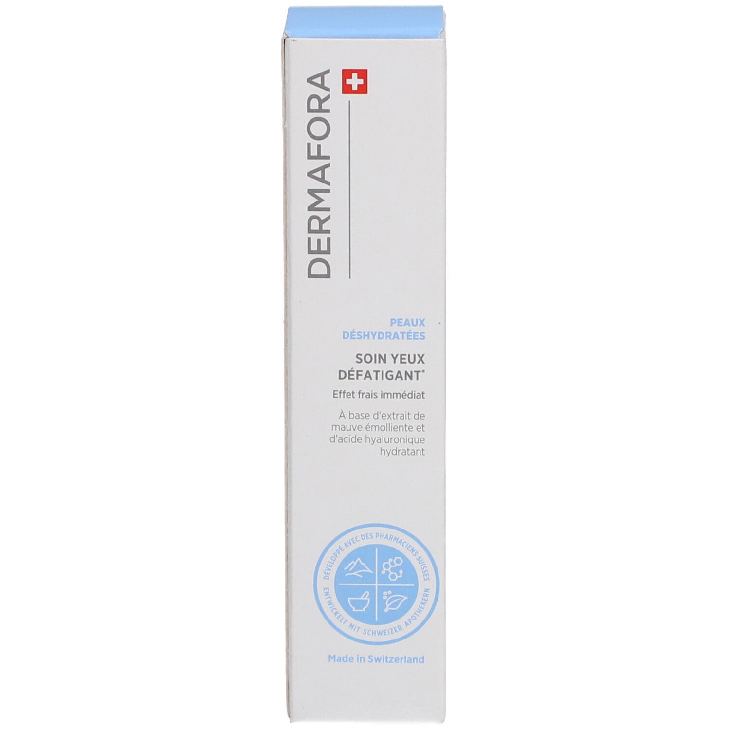 Boîte blanche avec informations sur le produit. Inscription: Dermafora, Soin yeux défatigant. Croix suisse.