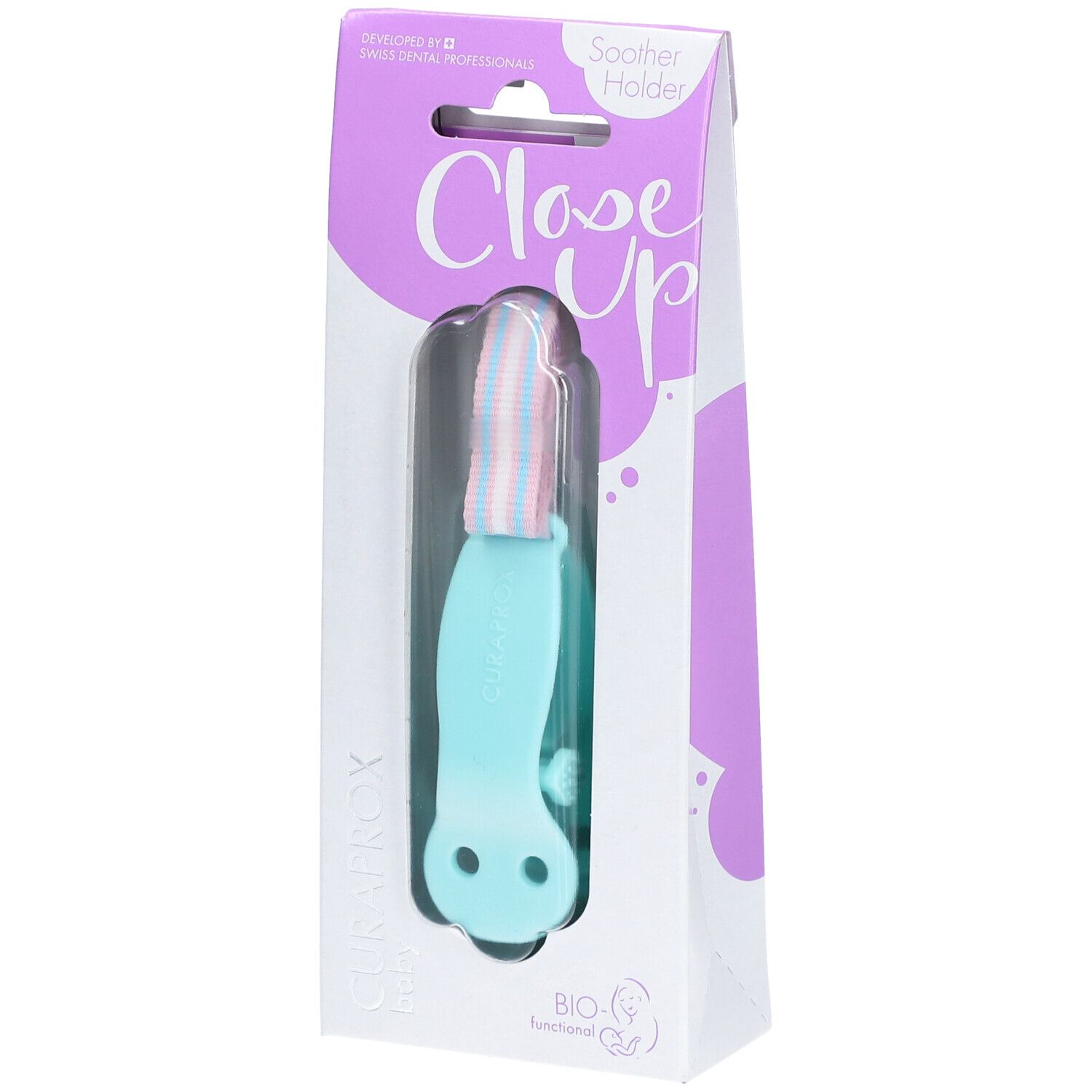 Attache-sucette turquoise dans son emballage. Visible : CURAPROX, Close Up, BIO-Fonctionnel. Attache avec bande rose et bleue.