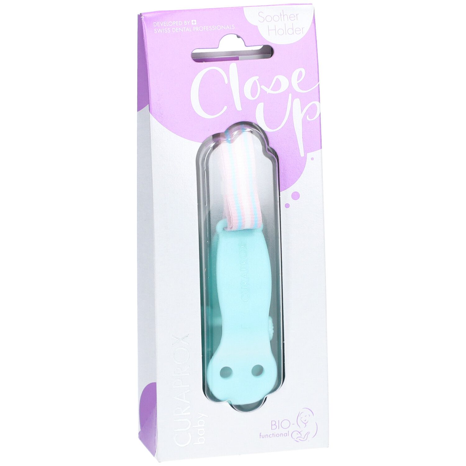 Attache-sucette turquoise dans son emballage. Visible : CURAPROX, Close Up, BIO-Fonctionnel. Attache avec bande rose et bleue.