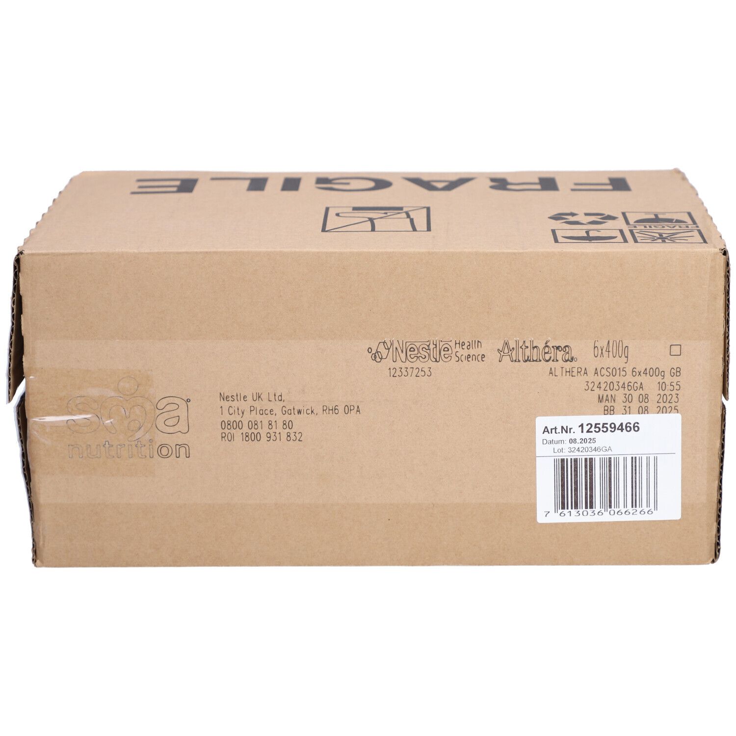 Boîte en carton avec inscriptions, dont "FRAGILE" et informations produit. Inscription "ALTHERA 6x400g GB".