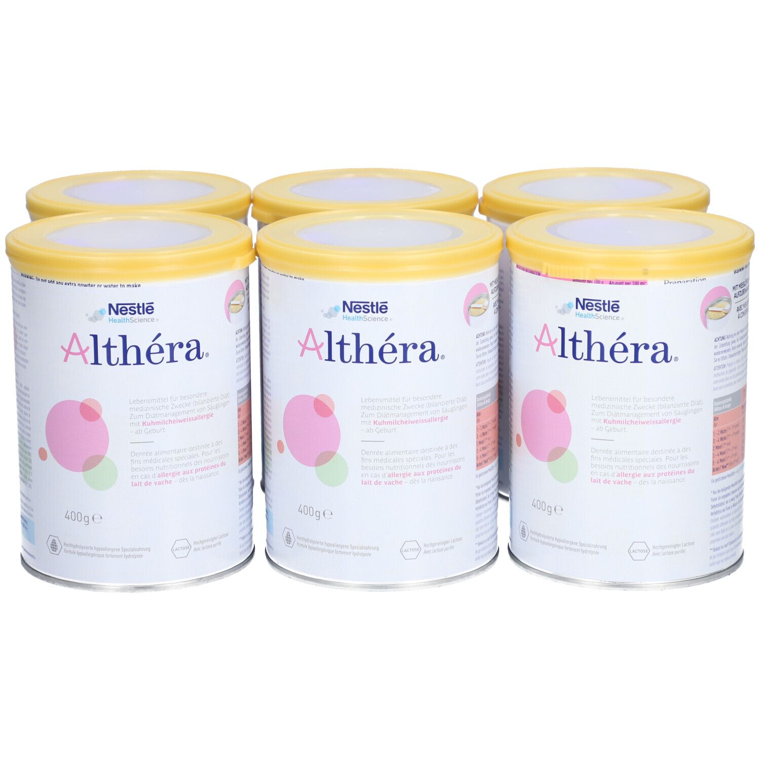 Six boîtes avec couvercles jaunes. Inscription "Althéra" et "400g". Cercles roses et verts comme éléments de design.