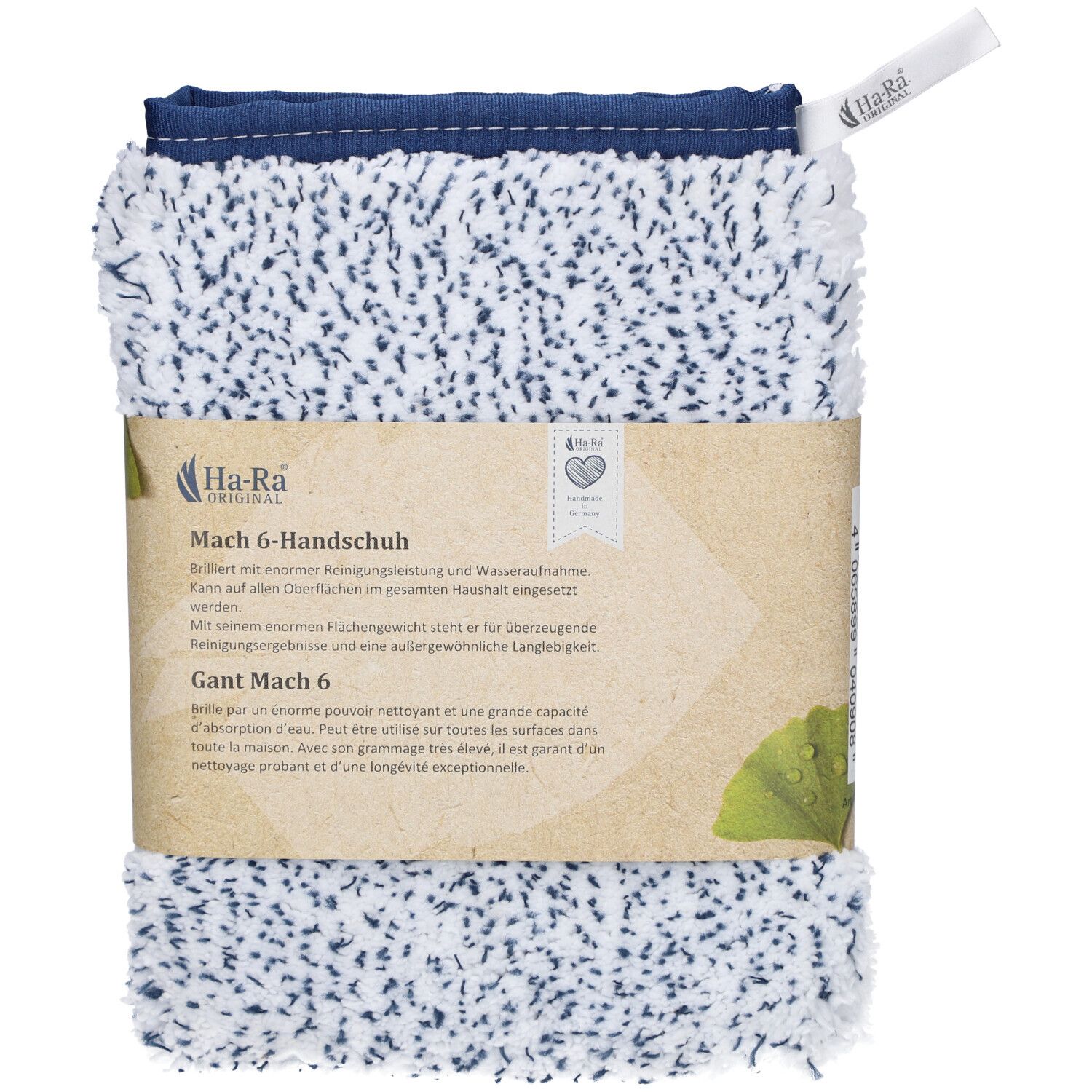 Gants de nettoyage emballés. Blanc à pois bleus, bordure bleue. Bande de papier avec nom et logo du produit.