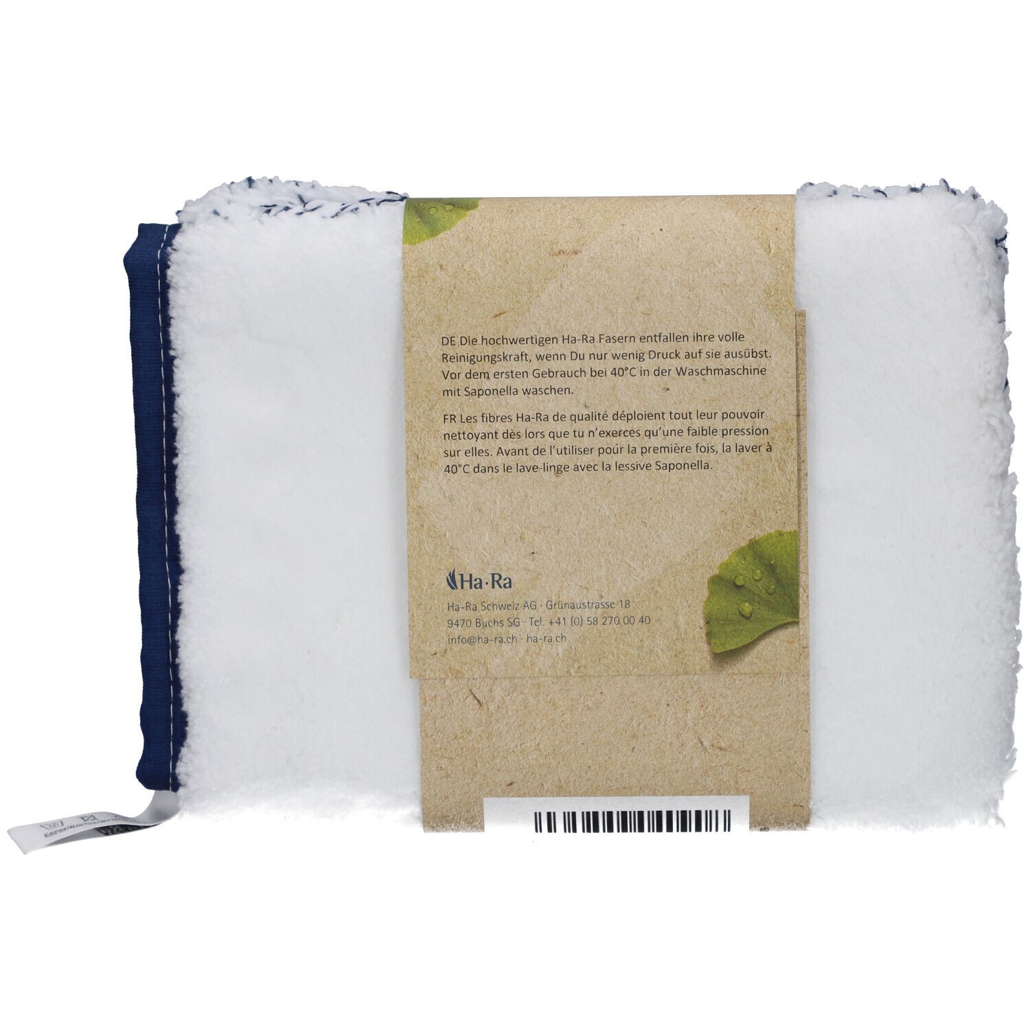 Dos des gants de nettoyage. Blanc à pois bleus, bordure bleue. Bande de papier avec texte et logo.
