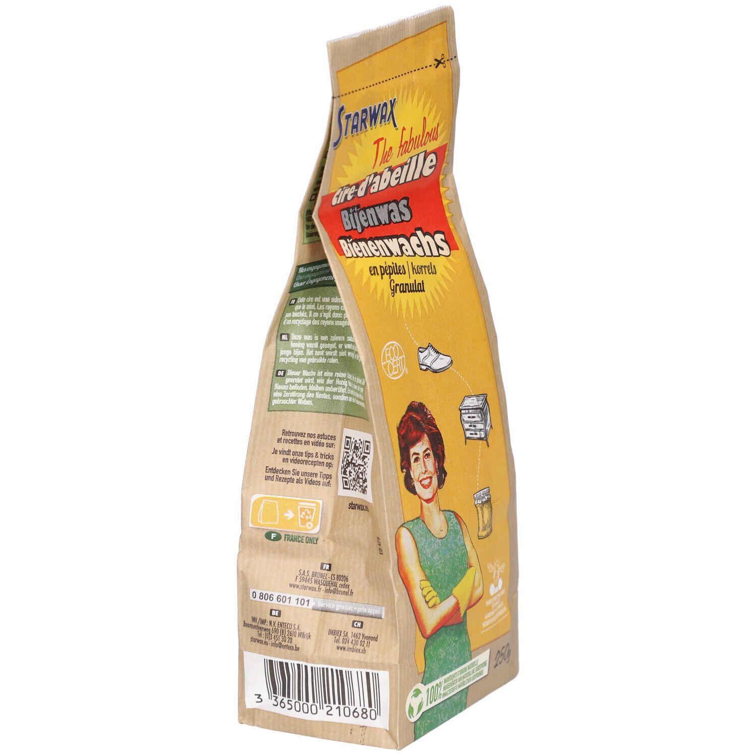 Vue latérale du sachet de cire d'abeille en granulés. Inscriptions: Starwax, Cire d'abeille, Bienenwas, Granulat. Femme avec gants jaunes.