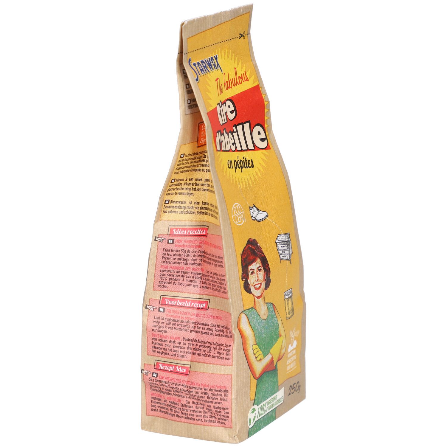 Vue latérale du sachet de cire d'abeille en granulés. Inscriptions: Starwax, Cire d'abeille, Bienenwas, Granulat. Femme avec gants jaunes.