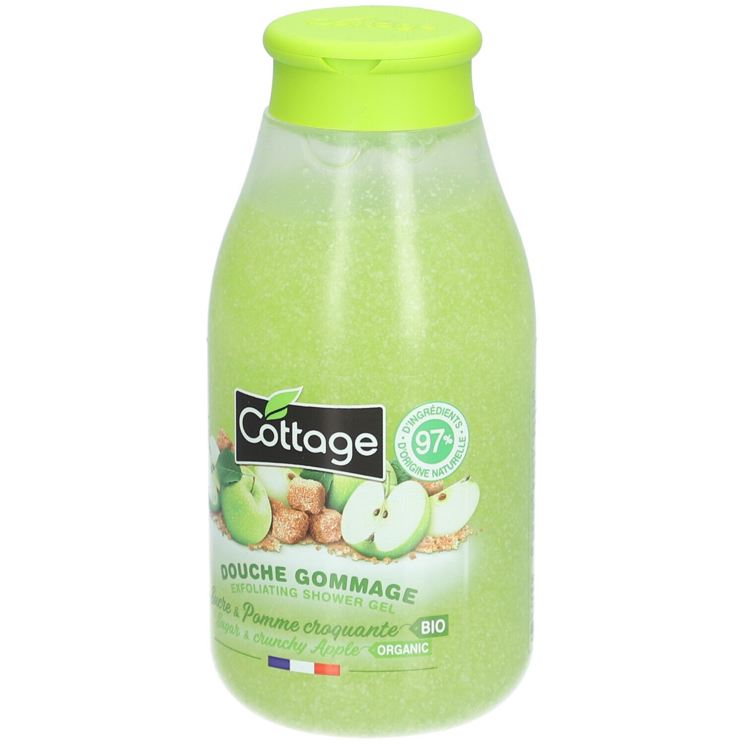 Gel douche exfoliant Cottage, vert. Bouteille avec bouchon vert. Étiquette avec illustrations de pommes et texte.