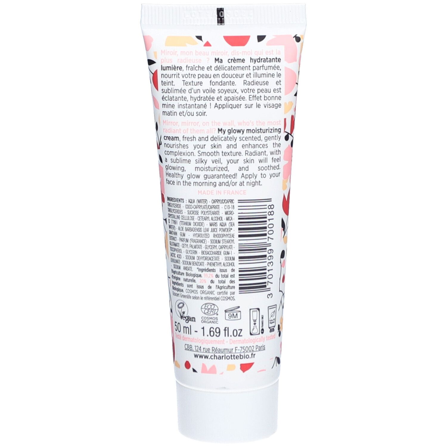 Dos du tube de crème avec motif floral. Contient du texte en français et anglais, ainsi que les ingrédients.