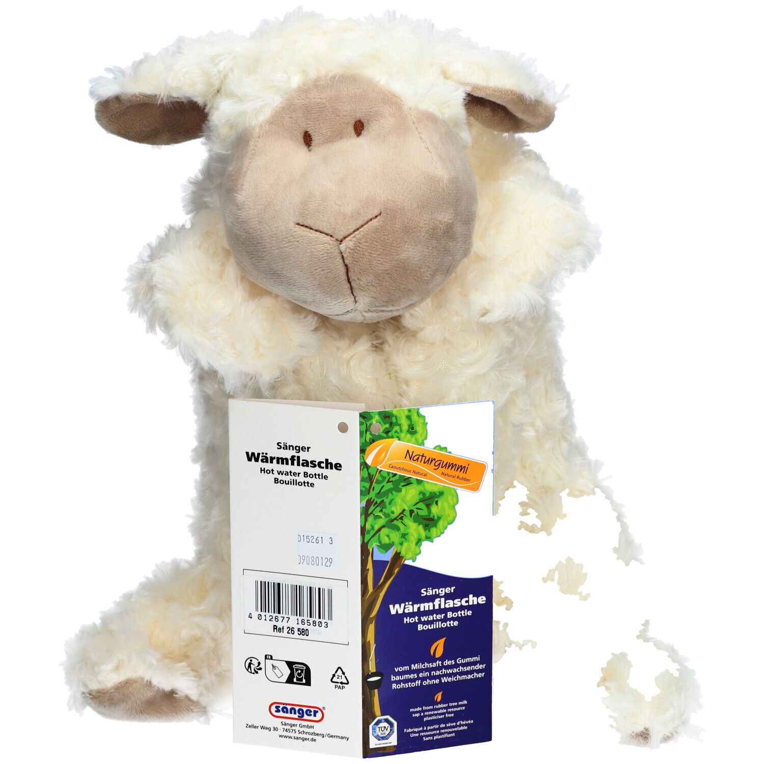 Mouton en peluche avec étiquette. Étiquette avec informations sur le produit. Mention caoutchouc naturel.