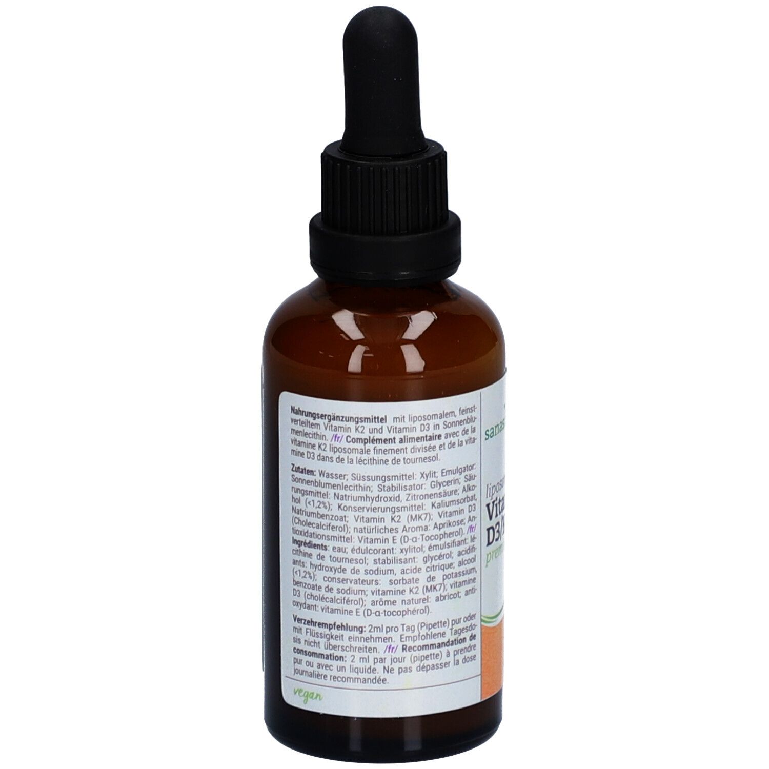Flacon en verre brun avec bouchon noir et pipette. Étiquette avec ingrédients et informations nutritionnelles. Label vegan.