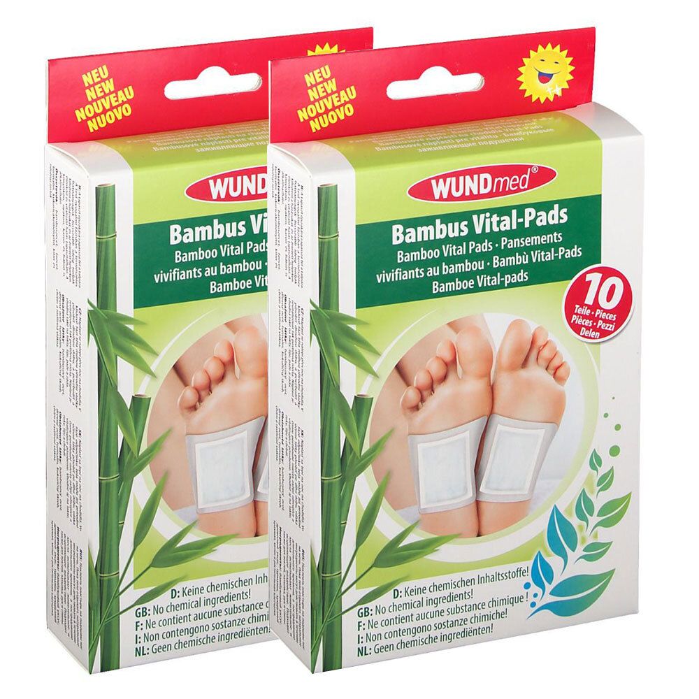Deux boîtes de WUNDmed Bambus Vital-Pads. Inscription : 10 pièces. Emballage vert et blanc avec pieds et coussinets.