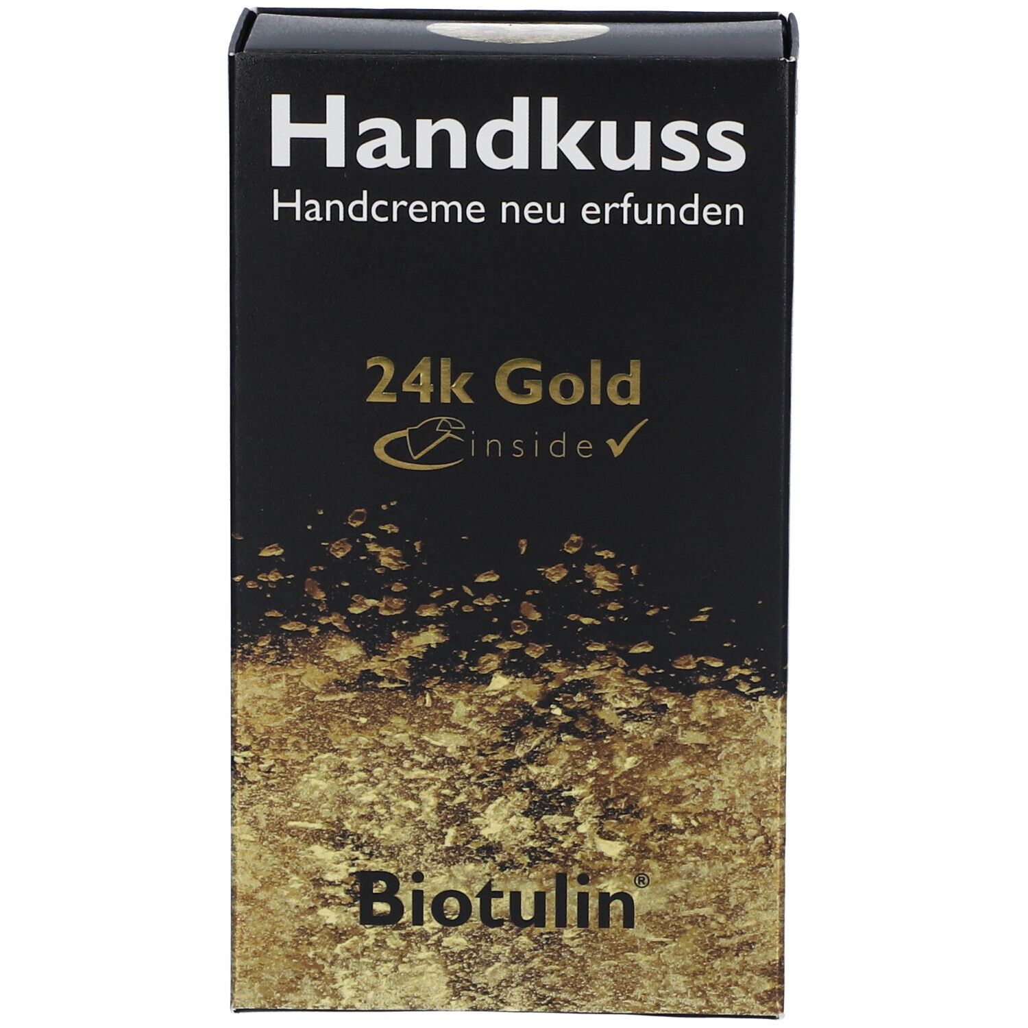 Boîte noire avec impression dorée. Texte: Handkuss, 24K Gold, Biotulin. Crème pour les mains réinventée.