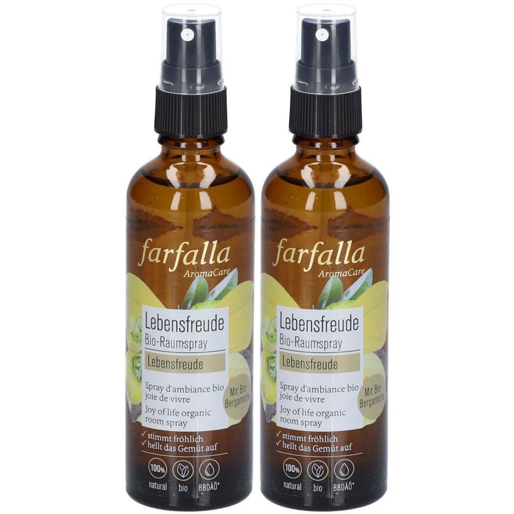 Deux flacons en verre brun avec vaporisateur. Les étiquettes indiquent "farfalla Lebensfreude Bio-Raumspray".