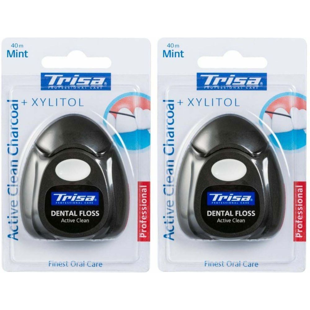Deux paquets de fil dentaire. Récipients noirs avec "Trisa Dental Floss Active Clean". Emballage avec "Mint" et "Xylitol".