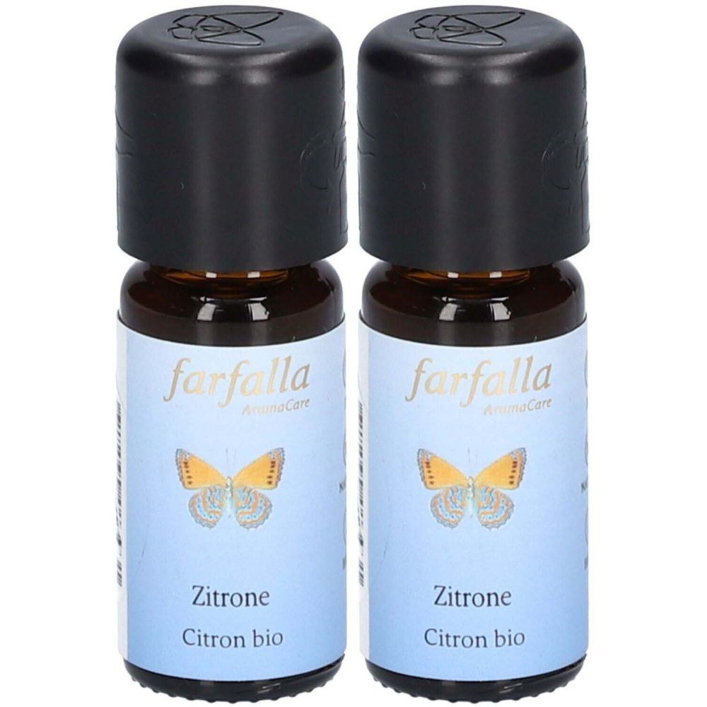 Deux petites bouteilles en verre brun avec des bouchons noirs. Les étiquettes indiquent "farfalla" et "Zitrone".