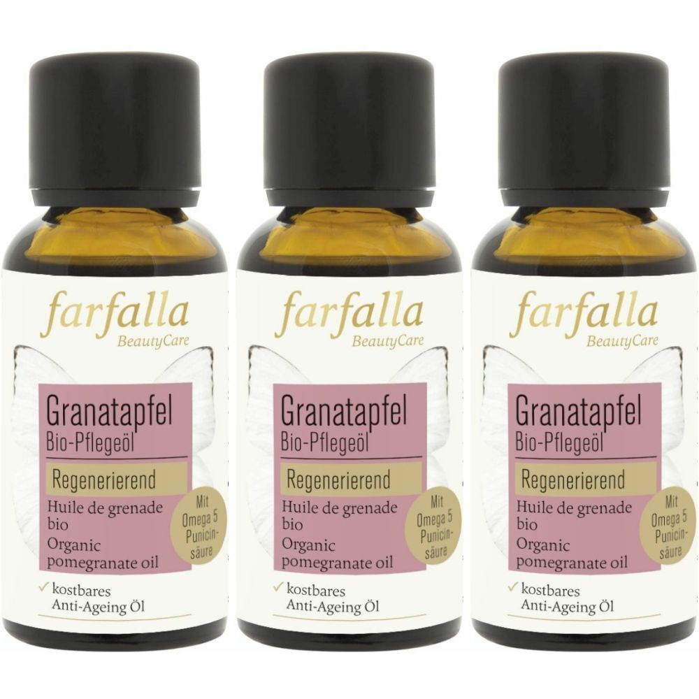 Trois flacons d'huile de grenade bio FARFALLA. Flacons en verre brun avec bouchons noirs. Étiquette avec informations.