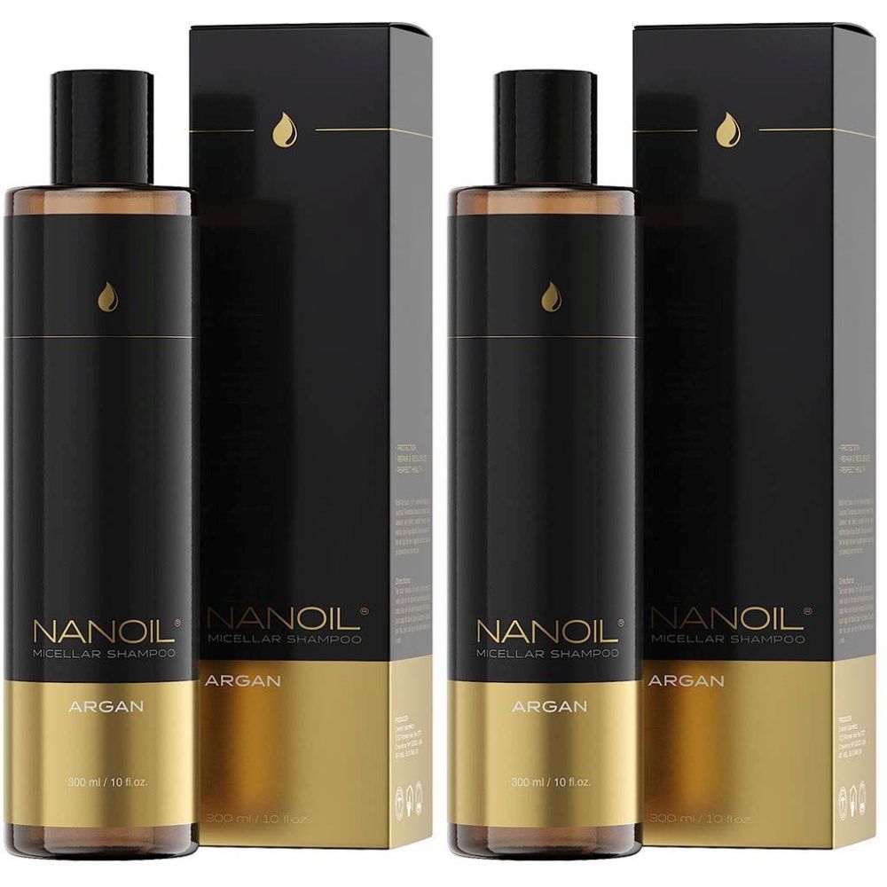 Deux flacons de shampooing micellaire NANOIL Argan avec emballage. Flacons noirs avec des accents dorés et logo.