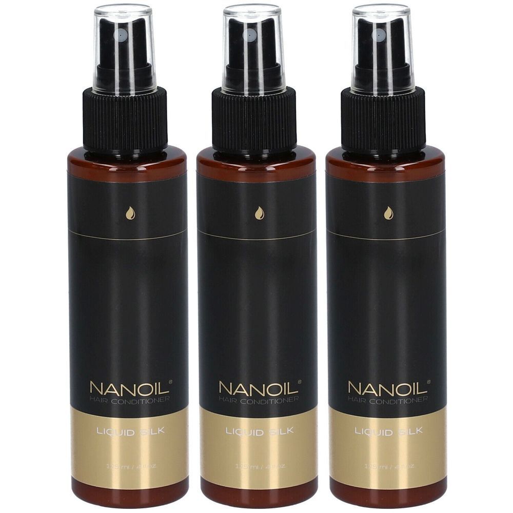 Trois flacons de NANOIL Hair Conditioner. Flacons noirs avec vaporisateur. Inscription : Liquid Silk.