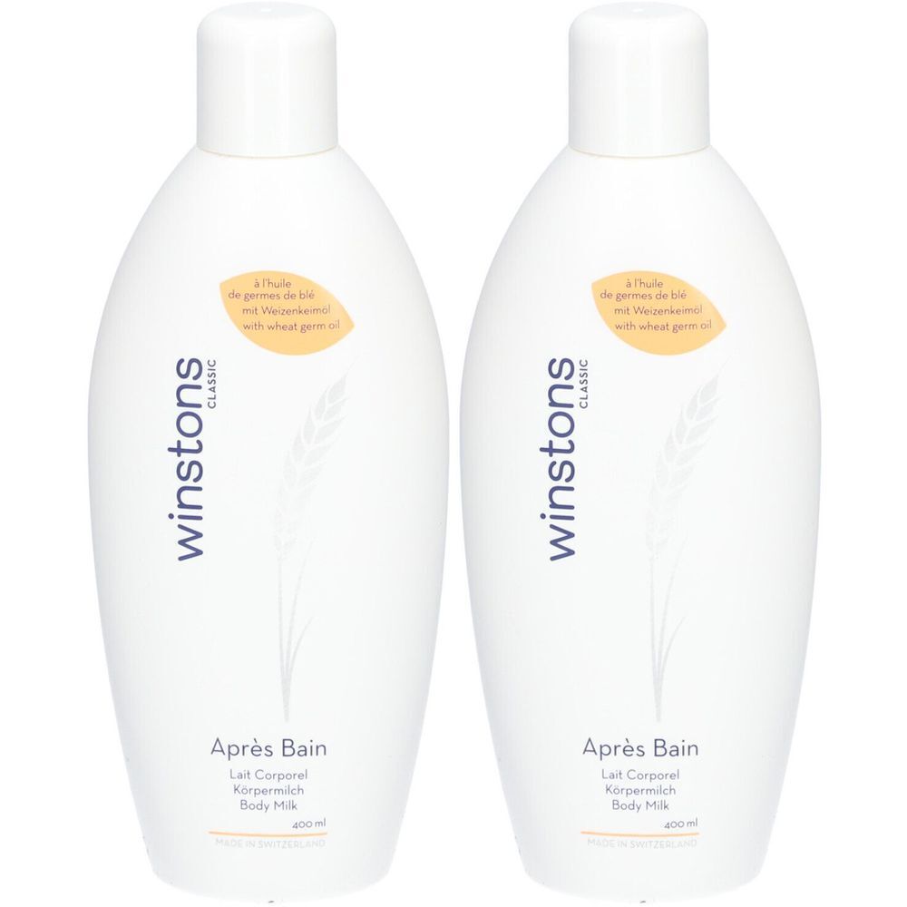 Deux flacons blancs avec bouchons blancs. Inscription : winstons classic, Après Bain, Lait Corporel. Étiquette jaune avec texte.
