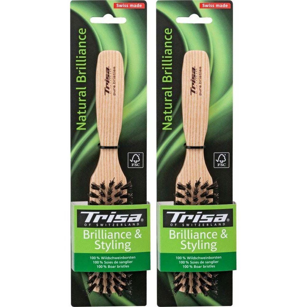 Deux brosses à cheveux emballées. Manche en bois, soies. Inscriptions : Trisa, Natural Brilliance, Brilliance & Styling, label FSC.
