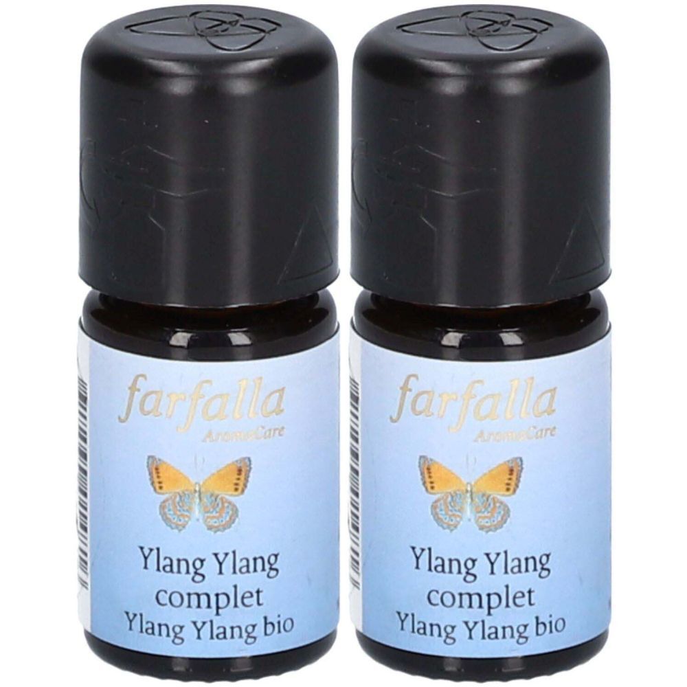 Deux flacons avec bouchons noirs. Étiquettes bleues avec "farfalla", "Ylang Ylang complet Ylang Ylang bio" et un papillon.