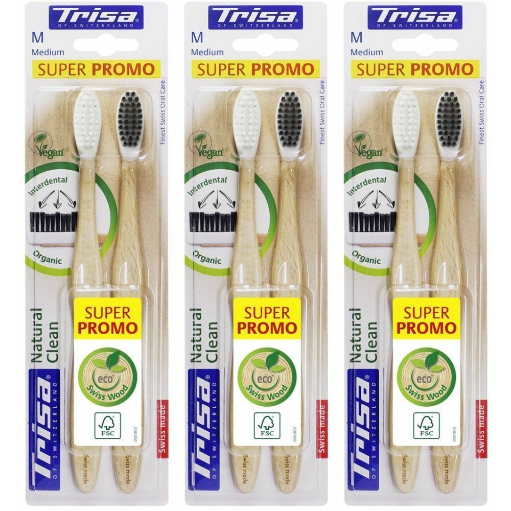 Trois brosses à dents emballées. Marque Trisa, modèle Natural Clean, medium. Avec logo FSC et Vegan. Autocollant "Super Promo".