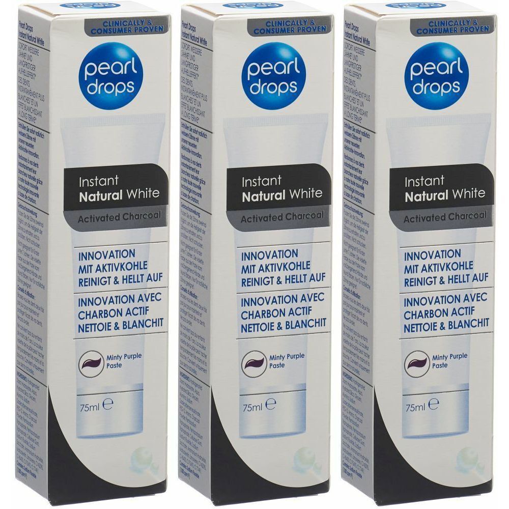 Trois boîtes de dentifrice. Inscription: Pearl Drops Instant Natural White, charbon actif. 75ml. Pâte violette mentholée.