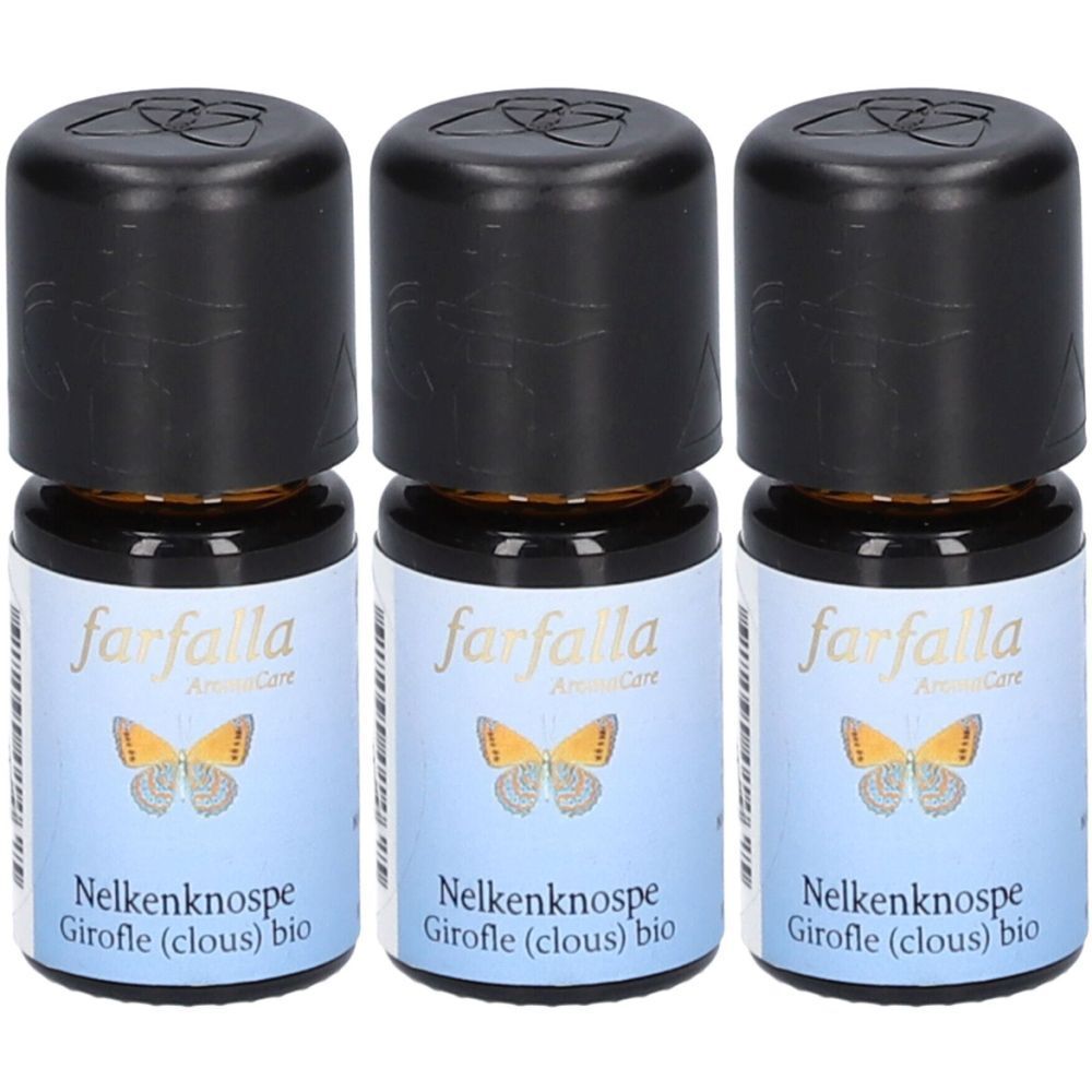 Trois petites bouteilles en verre brun avec des bouchons noirs. Les étiquettes indiquent "farfalla", "Nelkenknospe Girofle (clous) bio" et un papillon.