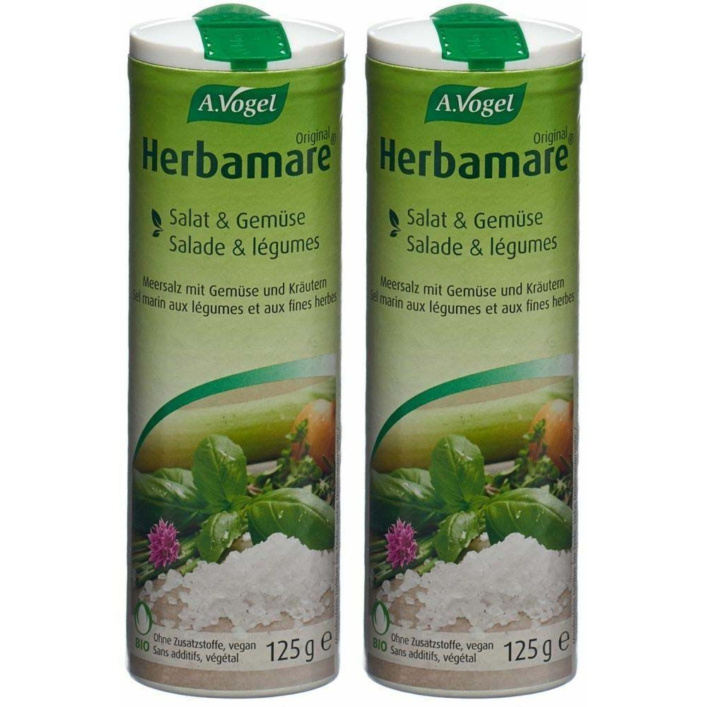 Deux boîtes vertes de sel "Herbamare". Inscription : Salade & légumes. 125g. Vegan. Logo A. Vogel.