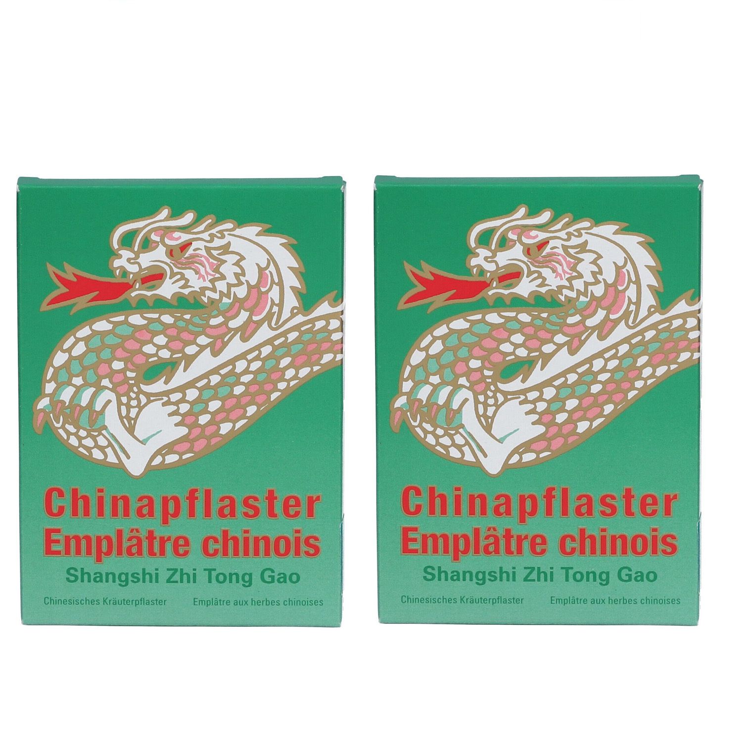 Deux boîtes vertes avec un motif de dragon. Inscription : Chinapflaster, Emplâtre chinois, Shangshi Zhi Tong Gao.