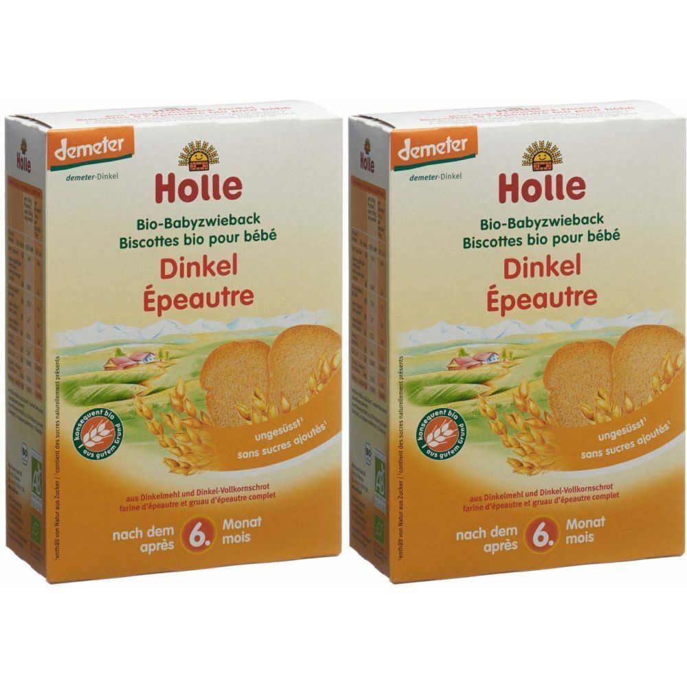 Deux boîtes de Holle Bio-Babyzwieback Dinkel. Inscription: Bio-Babyzwieback, Dinkel, à partir du 6e mois. Label Demeter.