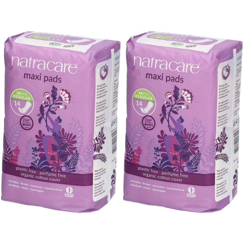 Deux paquets de serviettes hygiéniques Natracare Maxi Pads. Emballage violet avec motif floral. Texte : sans plastique, sans parfum, coton bio.